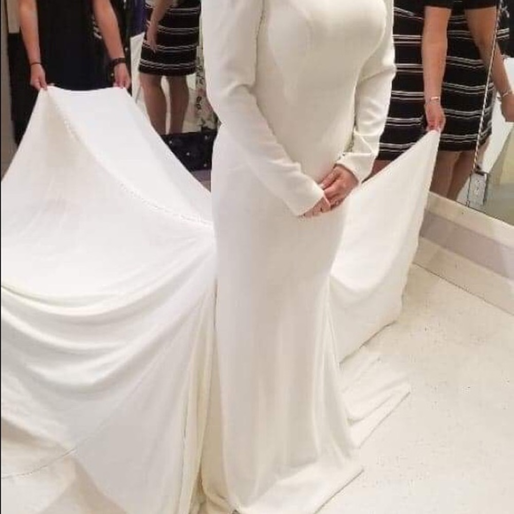 Wedding dress size 10 perfect condition never worn